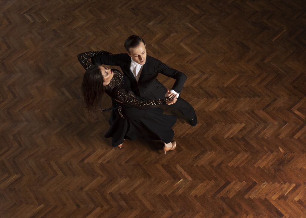 man woman dancing together ballroom scene (1)